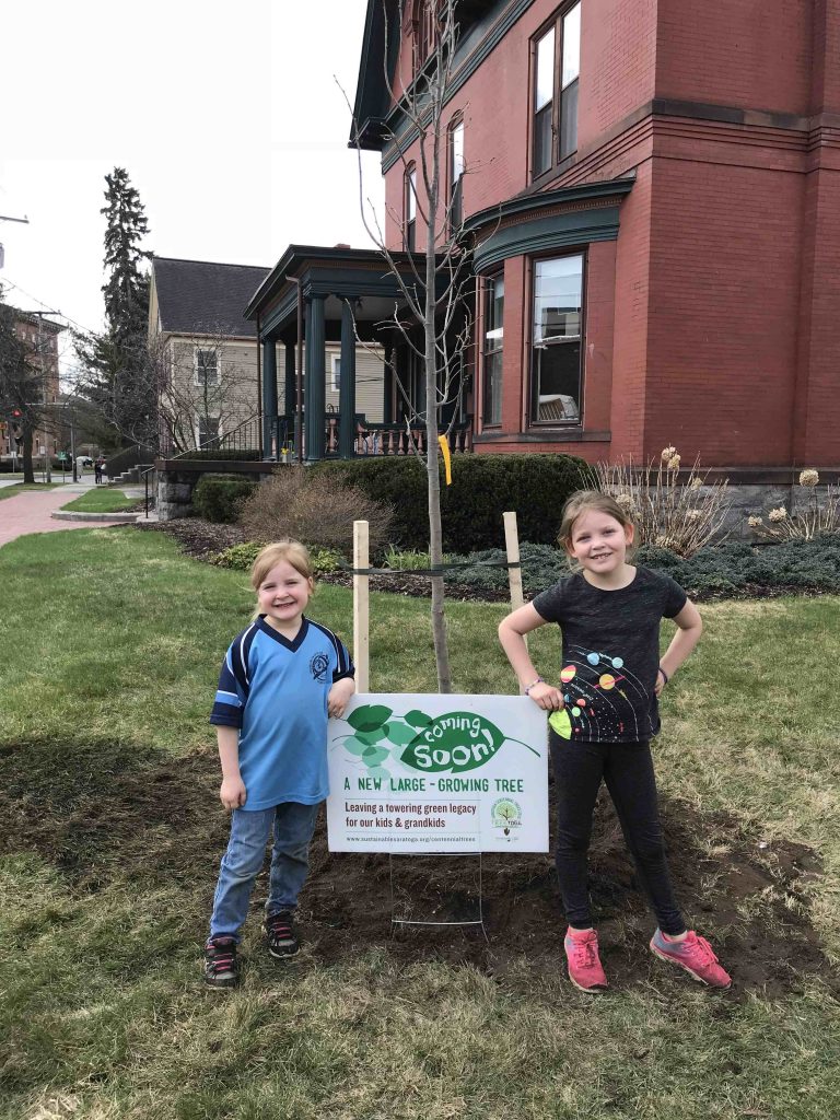 Kids planting a nextgen tree
