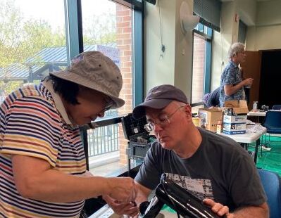 Repair Cafe repairing an appliance